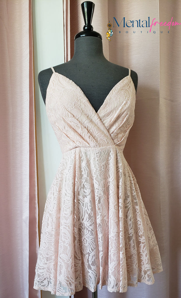 Light peach lace dress.