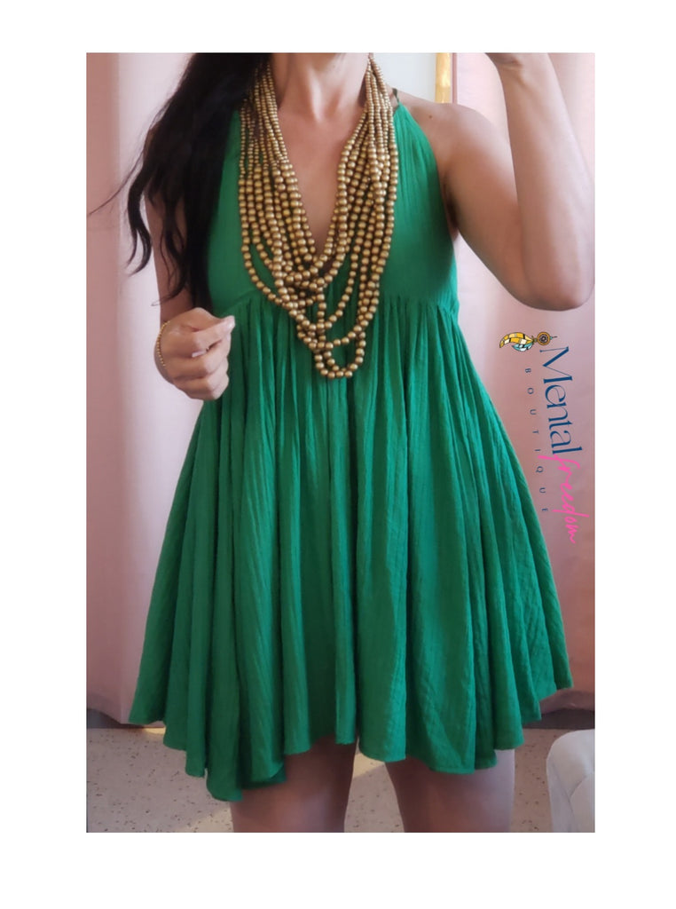 Green open back dress